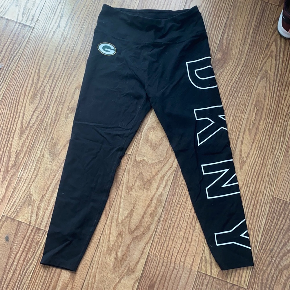 Leggings, Brand DKNY with a Packer logo on side. Size medium.